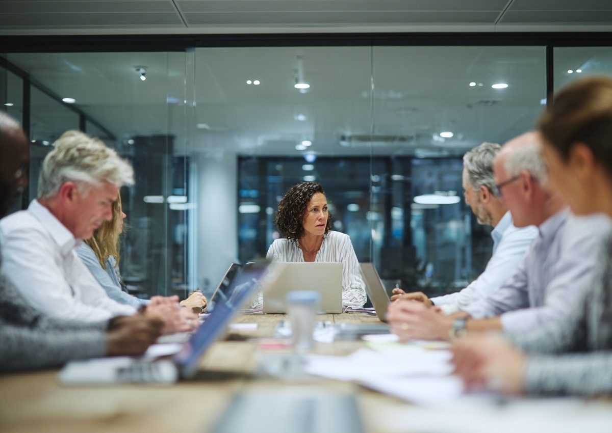 Professionals reviewing anti-corruption compliance policies and procedures